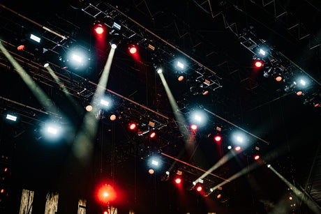 A group of people standing on top of a stage