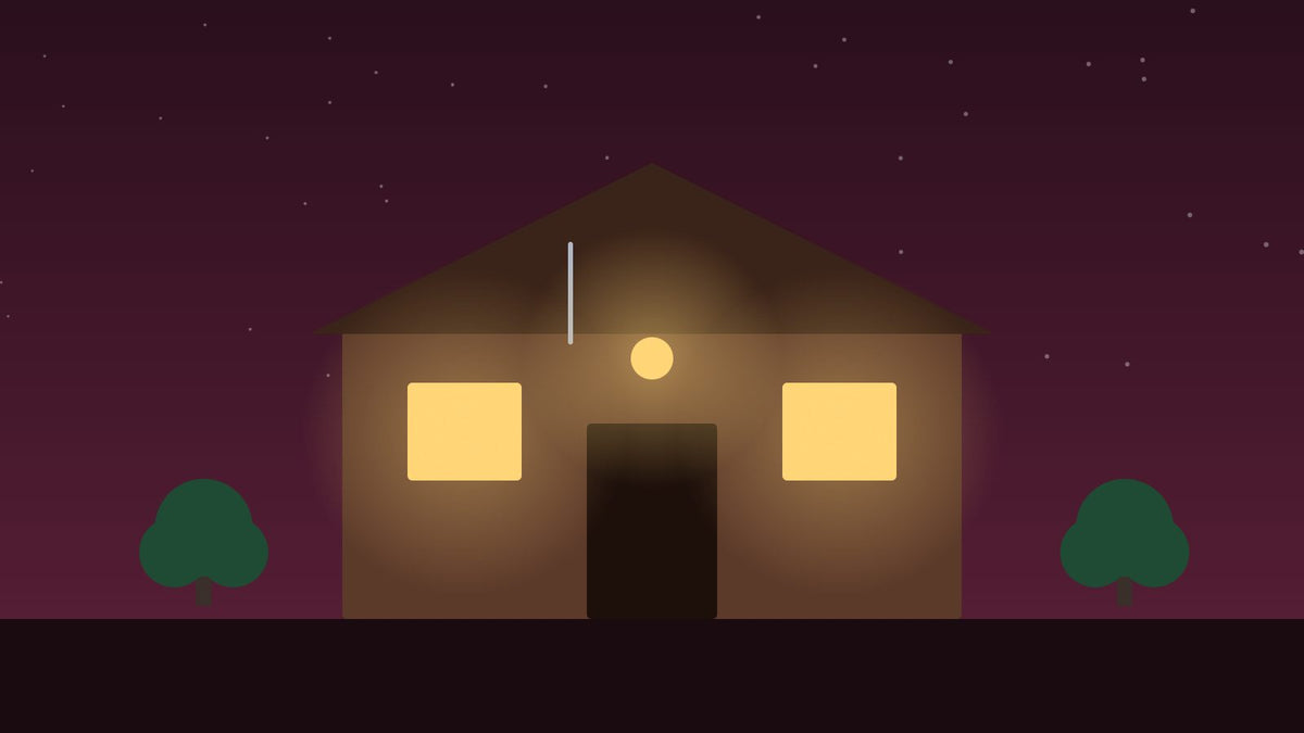 Verlichte schuur in de avond met warme lampen