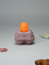 EggboxLAMP Rosé avec un œuf lumineux, lampe décorative dans une boîte à œufs rose