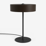 Moderne Studio Monton tafellamp met een ronde bronzen kap en een slanke zwarte voet