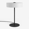Moderne tafellamp van Studio Monton met een zwart metalen basis en een witte lampenkap