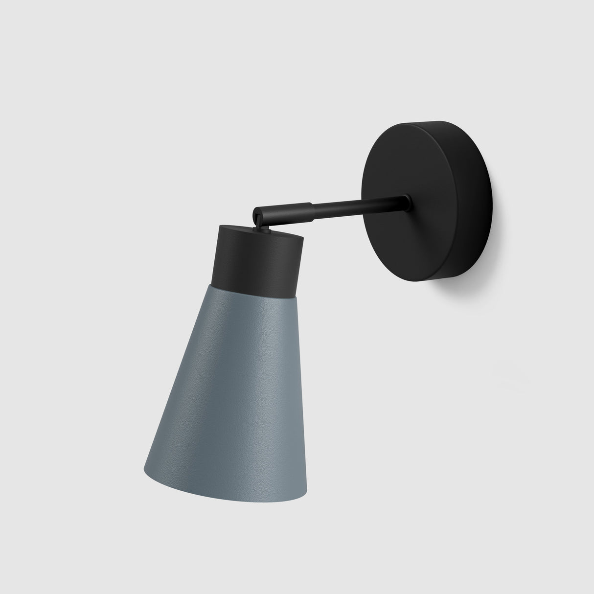 Moderne wandlamp van Studio Monton met een grijze kap en zwart montagesysteem